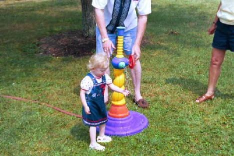 This spray was fun for the other kids. hmmm Let's see if I like this any better than Aunt Lin's pool. It's ok but get these wet clothes off me!