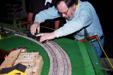 Only a pro can set a train on the track.